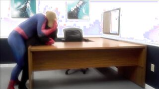 spiderman smashes robber he finds in an office