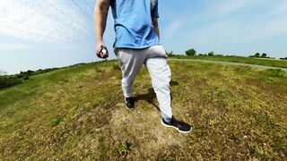 Freeballing walk in nature with a yam-sized sweatpants erection