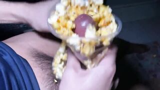 Wank off with popcorn.