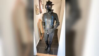 Wetsuit, gasmask, condom footwear and condom mittens