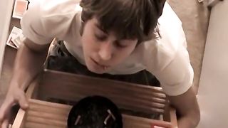 Cigar smoking youngster faps off wooly sausage and spunks in tray