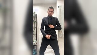 Jacking off with suit on